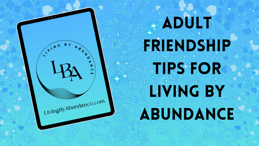 Digital graphic of a tablet displaying 'Living By Abundance' with the title 'Adult Friendship Tips for Living By Abundance' on a blue, heart-decorated background.