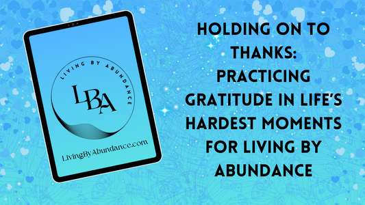 Digital graphic of a tablet displaying 'Holding on to Thanks: Practicing Gratitude in Life’s Hardest Moments for Living By Abundance' on a blue, heart-decorated background.