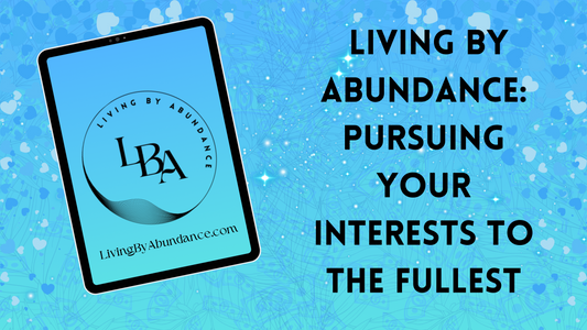 Digital graphic of a tablet displaying 'Living By Abundance: Pursuing Your Interests to the Fullest' on a blue, heart-decorated background.