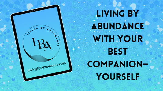 Digital graphic of a tablet displaying 'Living By Abundance with Your Best Companion—Yourself' on a blue, heart-decorated background.