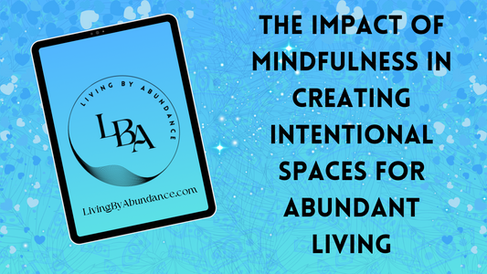 Digital graphic of a tablet displaying 'The Impact of Mindfulness in Creating Intentional Spaces for Abundant Living' on a blue, heart-decorated background.